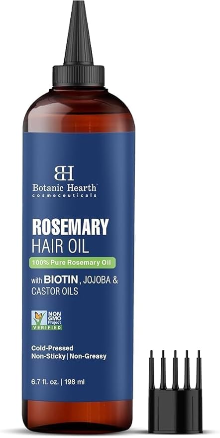 Botanic Hearth hair oil dropper on a white surface